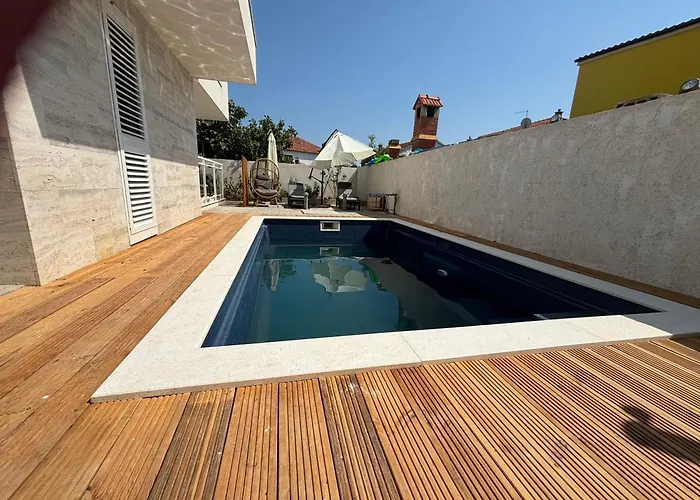 Regina Carlito With Swimming Pool *