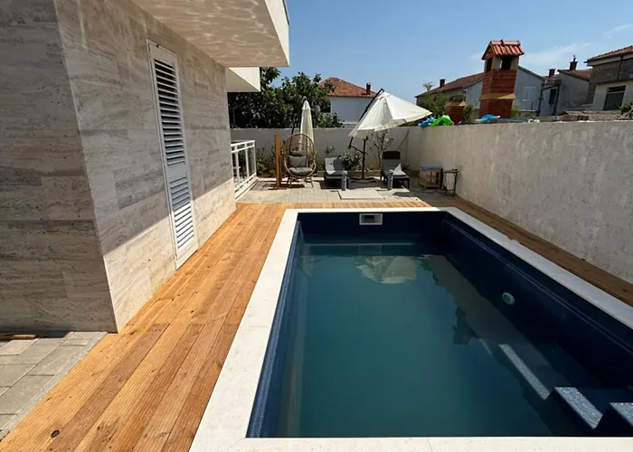 Regina Carlito With Swimming Pool *